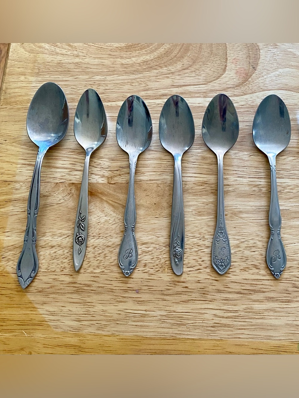 Stainless Steel Assorted Pattern Teaspoons - Silver Finish with one fork